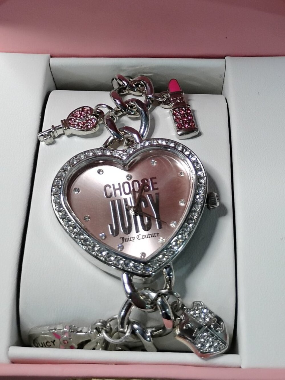 Juicy Couture silver-tone charm watch pink face accents and crystal rhinestones